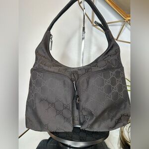 Gucci Black Hobo Bag with Monogram Pattern Authentic Excellent Condition.
